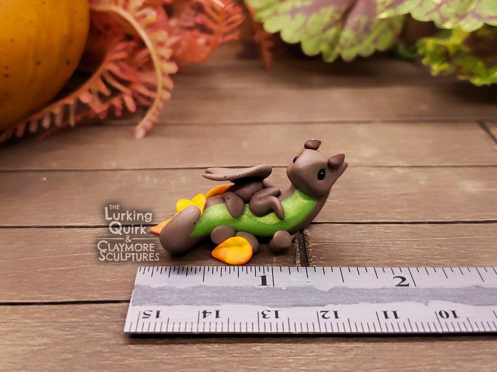 Mini Dragon in Autumn Leaves