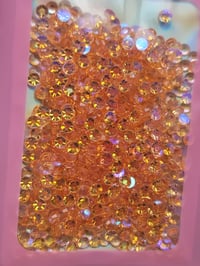 Image 1 of Peach crystal 