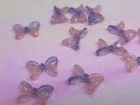 Image 3 of UV bow charm 