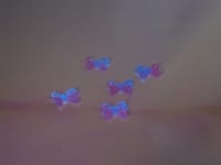 Image 4 of UV bow charm 