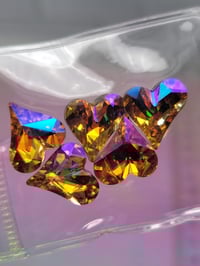 Image 1 of Peach k9 heart  shape dimond 
