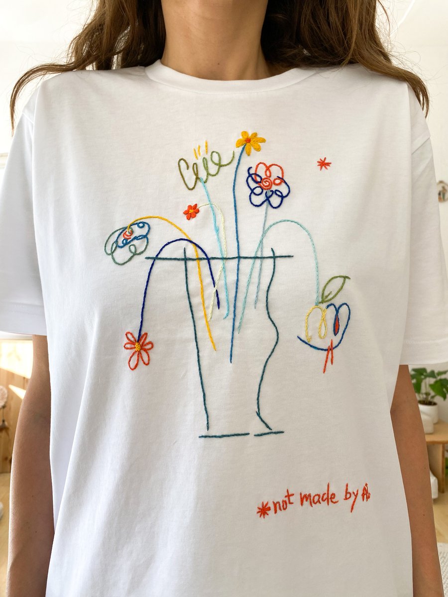 Image of Not made by AI, original hand embroidery on organic cotton t-shirt, unisex