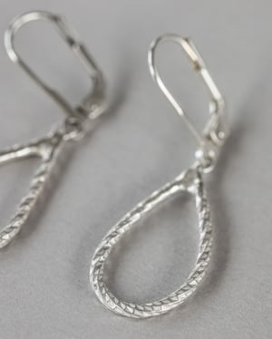 Image of Silver faceted tear drop earrings 