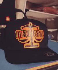 Image 3 of "DIFFERENT" ⚖️ TRUCKER HATS "BLACK/GREY" & "BLACK/ORANGE"