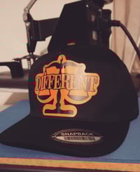 Image 4 of "DIFFERENT" ⚖️ TRUCKER HATS "BLACK/GREY" & "BLACK/ORANGE"