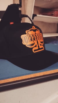 Image 5 of "DIFFERENT" ⚖️ TRUCKER HATS "BLACK/GREY" & "BLACK/ORANGE"