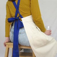 Image 2 of Undyed Canvas Apron with Royal Blue Adjustable Straps. Pleated Split Leg Pinafore No25