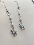 Image 1 of night sky phone charm