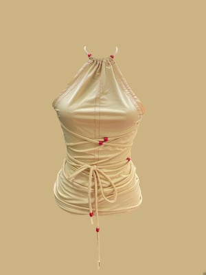 Image of creme contrast stitch halter top