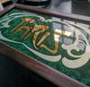 Gilded and painted glass sign