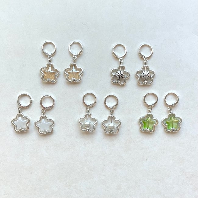 metal flower star silver huggie earrings