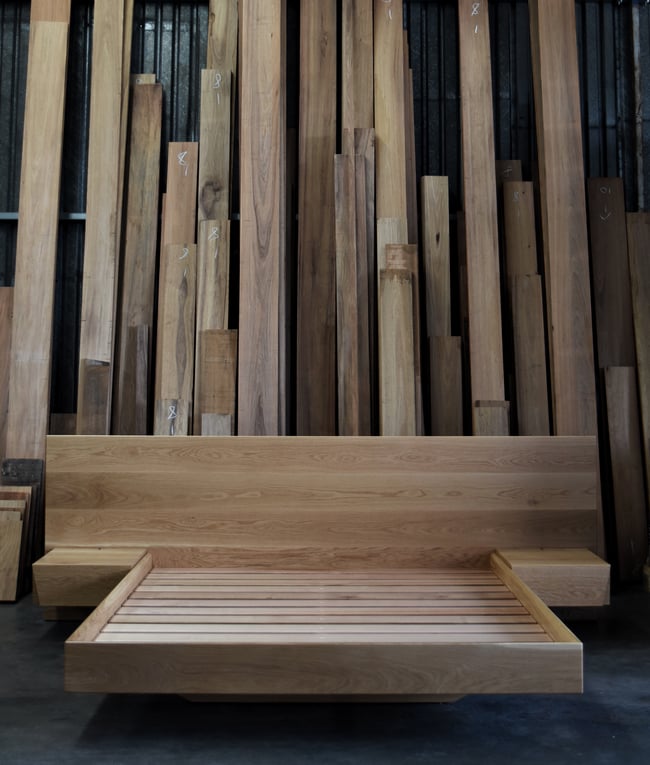 FLOATING BED WITH CLIPPED WING DRAWERS IN AMERICAN OAK