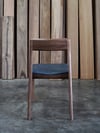 ROSE DINING CHAIR IN AMERICAN WALNUT WITH AN UPHOLSTERED LEATHER SEAT