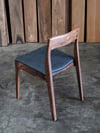 ROSE DINING CHAIR IN AMERICAN WALNUT WITH AN UPHOLSTERED LEATHER SEAT