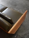 CLOVER COUCH IN TASMANIAN BLACKWOOD WITH SUNDANCE LEATHER