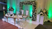 Image 1 of Stage design with green  and white silk  flowers  