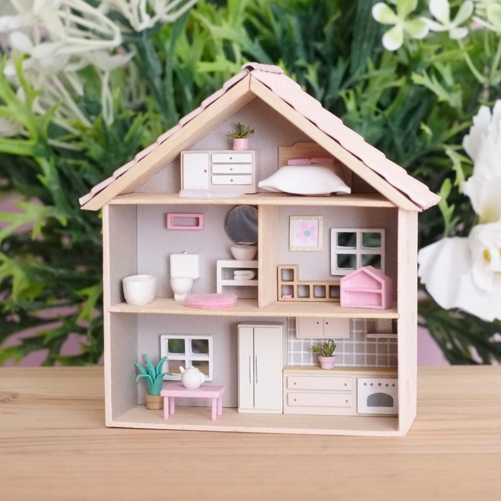 Tiny beige dollhouse