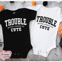 TROUBLE ONESIE
