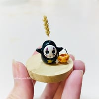 Image 1 of Cute no face with jack o lantern figurine (with hole for tiny flower)