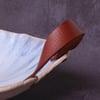 Centrepiece bowl with leather handles