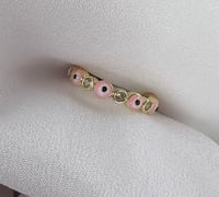 Pink evil eye adjustable ring