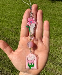 Kewpie flower charm 