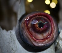 Image 2 of Custom Swappable Phone Grip for smartphones, reflective pupil, green glow in the dark