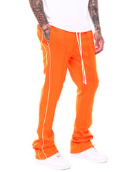 Image 1 of Stacked Track Pants Orange