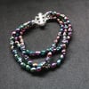 Triple strand Rainbow Hematite skull Bracelet
