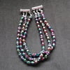 Triple strand Rainbow Hematite skull Bracelet