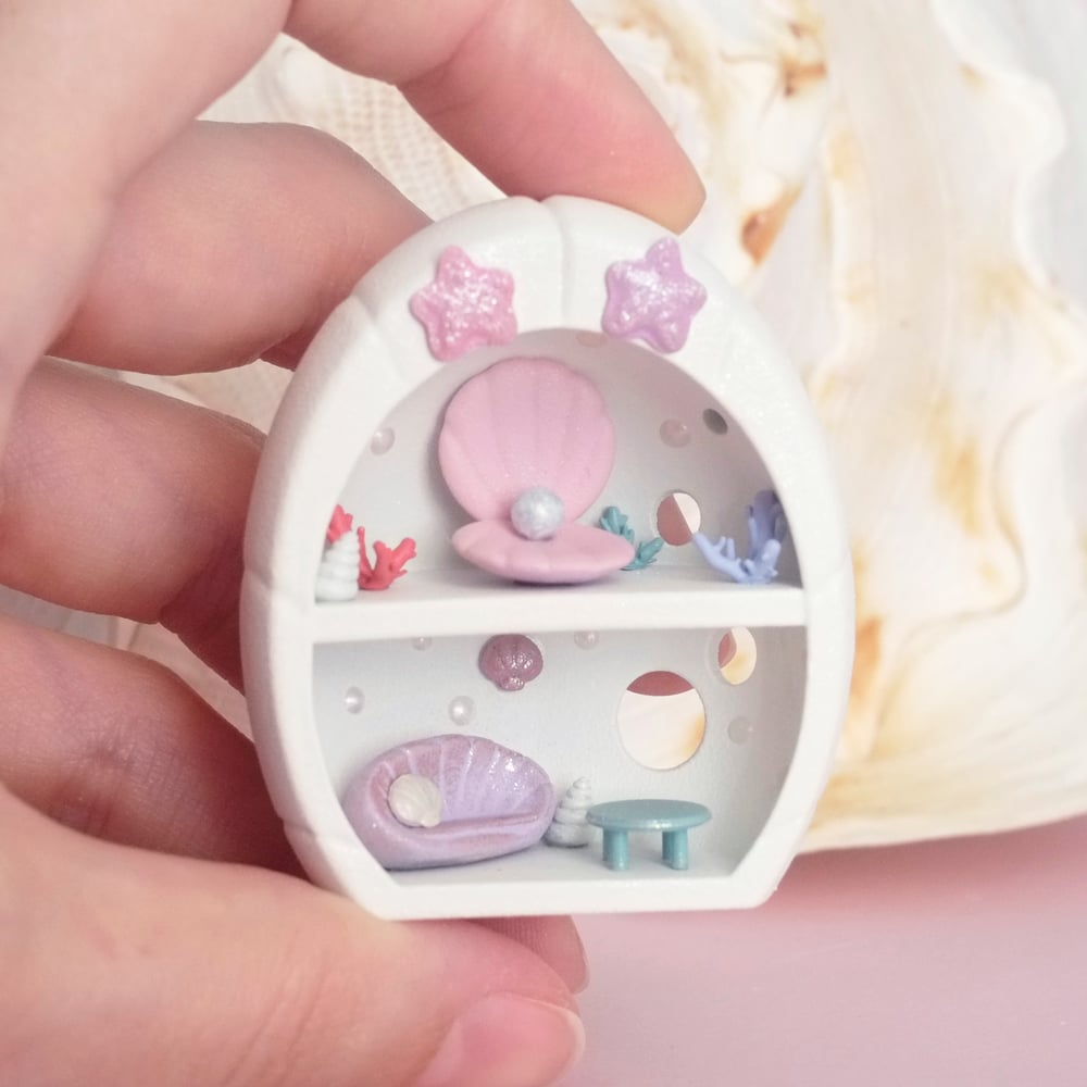 White shell miniature house