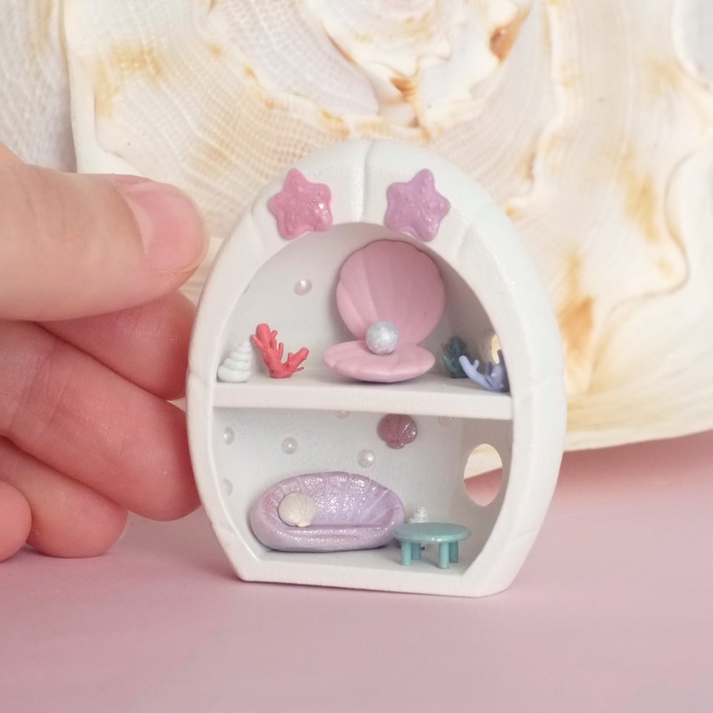 White shell miniature house