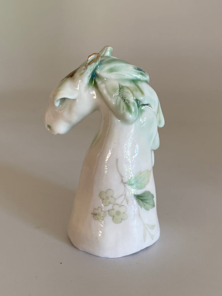 Image of Green Horse with wings and flower detail