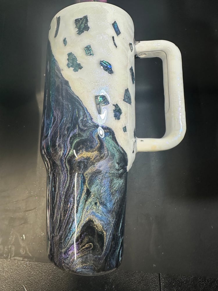 Image of 40oz with rocks purple gold blue