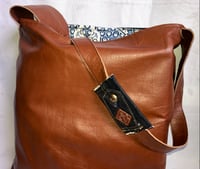 Image 4 of Reversible Indigo Denim Messenger Bag W/4 Way Storage Pockets, Leather Accent Button Front Detail