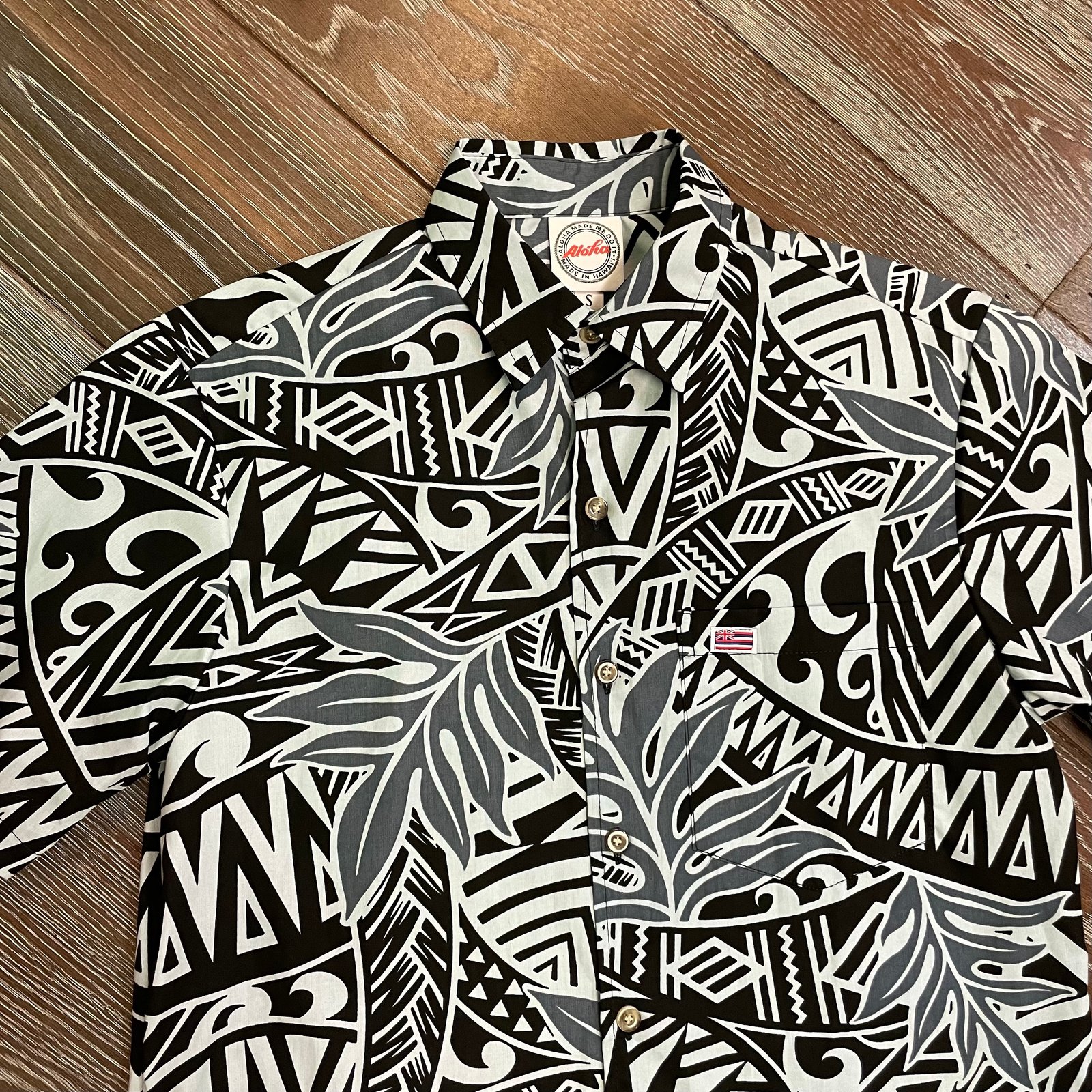 Black and store white hawaiian shirt