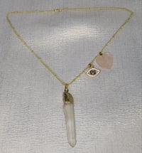 Image 1 of Gold tone 16in necklace, with 2 chams 