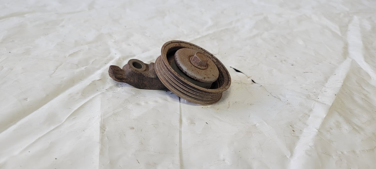 Image of Used 94-01 Acura Integra AC Idler A/C Compressor Belt Tensioner pulley