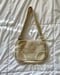 Image of pearlescent bow shoulder bag