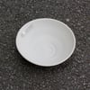 Shallow stoneware bowl with matt white glaze