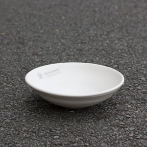 Shallow stoneware bowl with matt white glaze