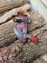 Image 1 of Finger Hole Skinner