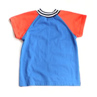 Image 2 of superstripe orange blue patchwork stripe baseball sleeve 6/7 courtneycourtney tee shirt unisex top
