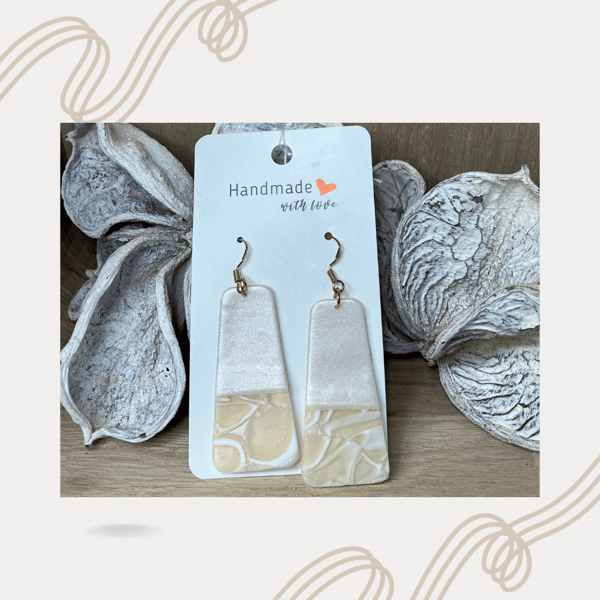 Image of Cream and tan dangle earrings