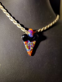 Image 3 of Amber purple & jet black shark tooth pendant. 