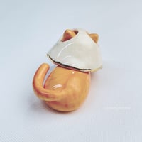 Image 5 of Orange loaf cat with ghost mask ceramic figurine