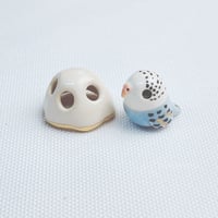 Image 1 of tiny budgie with ghost mask ceramic figurine (glow in dark) 