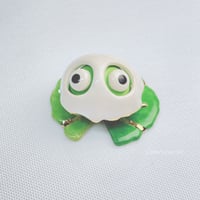 Image 3 of Frog on lily pad with ghost mask ceramic figurine 