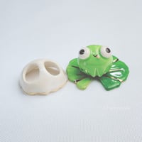 Image 1 of Frog on lily pad with ghost mask ceramic figurine 