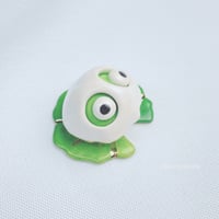 Image 4 of Frog on lily pad with ghost mask ceramic figurine 